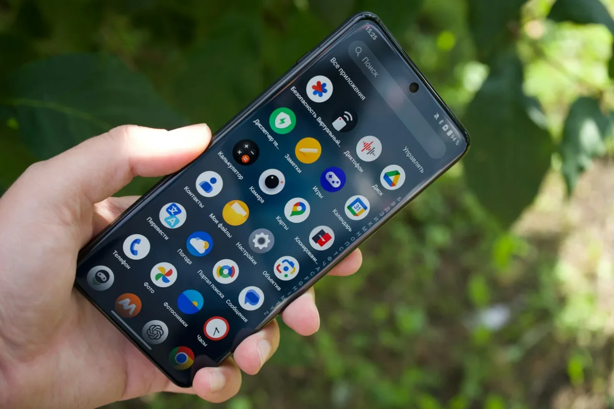 Modern smartphone held outdoors